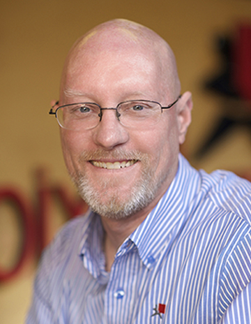 Portrait of Terry Edeker, Owner of Pixallure Design